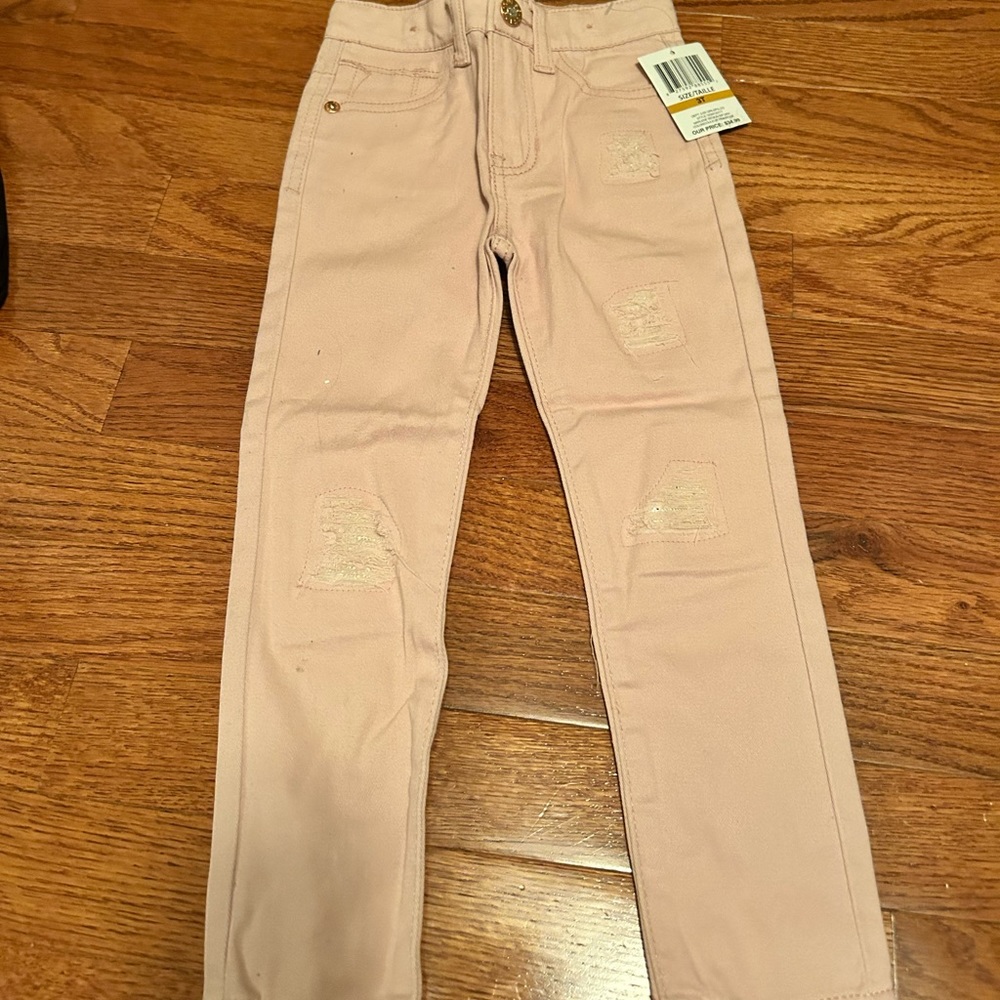 Guess distressed jeans in blush